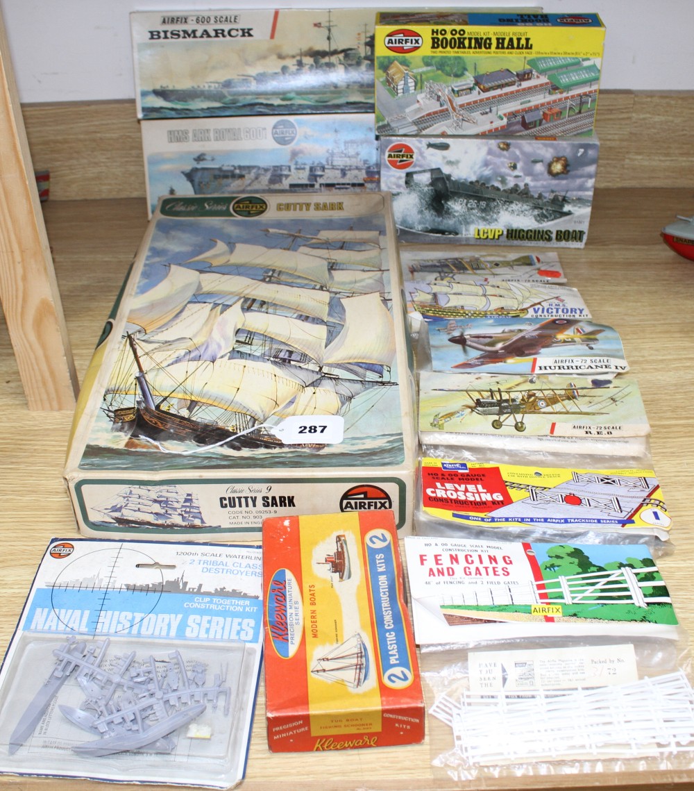 A group of vintage boxed and complete Airfix kits, comprising: Cutty Sark, Bismarck, HMS Ark Royal, LCVP Higgins boat 01321, OO Booking